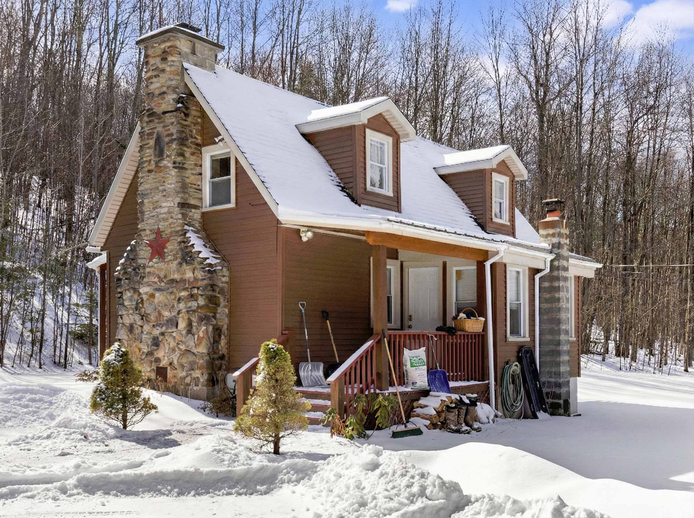 Exterior before preparation - cluttered with items and debris